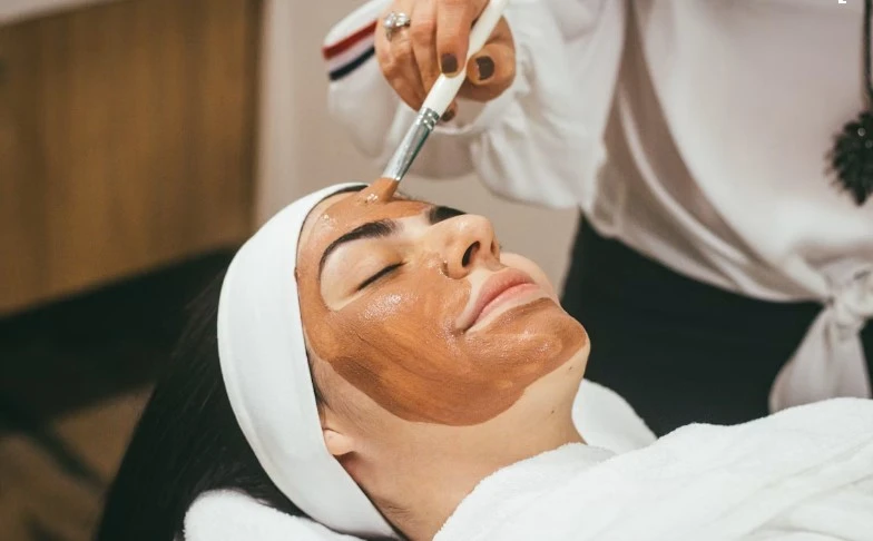Glycolic peel facial mask application for dead skin cell exfoliation